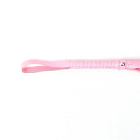 a pink handle on a white background