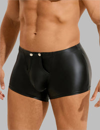 a man wearing a black leather boxer shorts