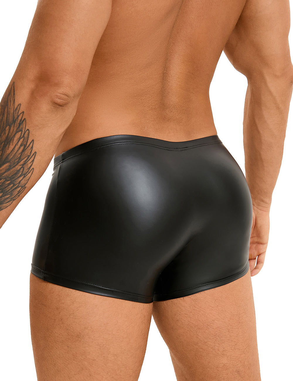 a man with a tattoo on his arm wearing a black leather shorts