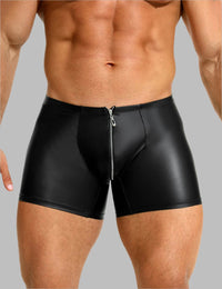 a man wearing a black leather shorts with a zipper