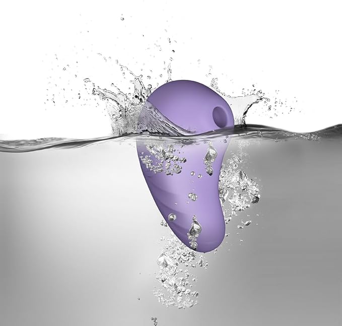 Rocks Off Sugar Boo Peek A Boo Suction Vibrator Lilac displayed in a serene setting, demonstrating its waterproof features and versatility for couples or solo pleasure.