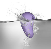 Rocks Off Sugar Boo Peek A Boo Suction Vibrator Lilac displayed in a serene setting, demonstrating its waterproof features and versatility for couples or solo pleasure.