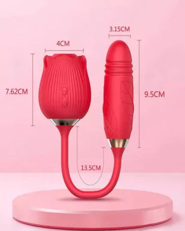 a close up of a red object on a pink background