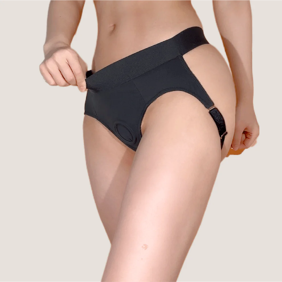 Flux Strap-On Harness – Femme-Forward Queer Lingerie showcasing its elegant design and soft feel, perfect for sapphic intimacy.