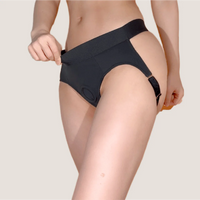 Flux Strap-On Harness – Femme-Forward Queer Lingerie showcasing its elegant design and soft feel, perfect for sapphic intimacy.