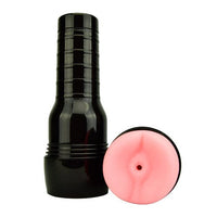 a close up of a black and pink lipstick