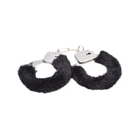 a pair of black furry handcuffs on a white background