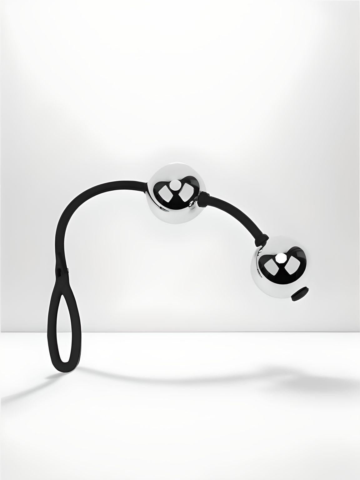 a black and white photo of a pair of scissors