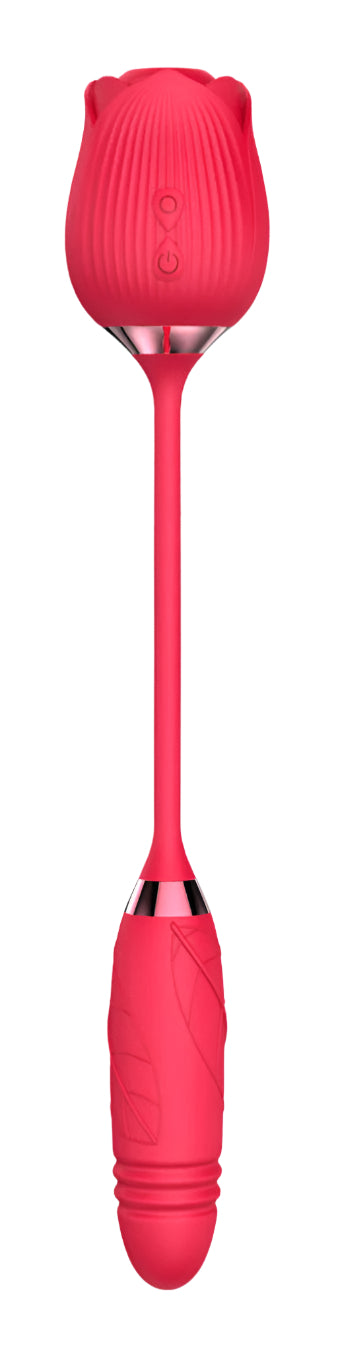 a woman laying on a bed with a vibrating device