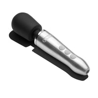 Elegant Doxy Go - Brushed Metal displayed in a travel setting, perfect for the doxy mini wand experience.