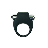 a black ring with a metal bullet vibrator on a white background