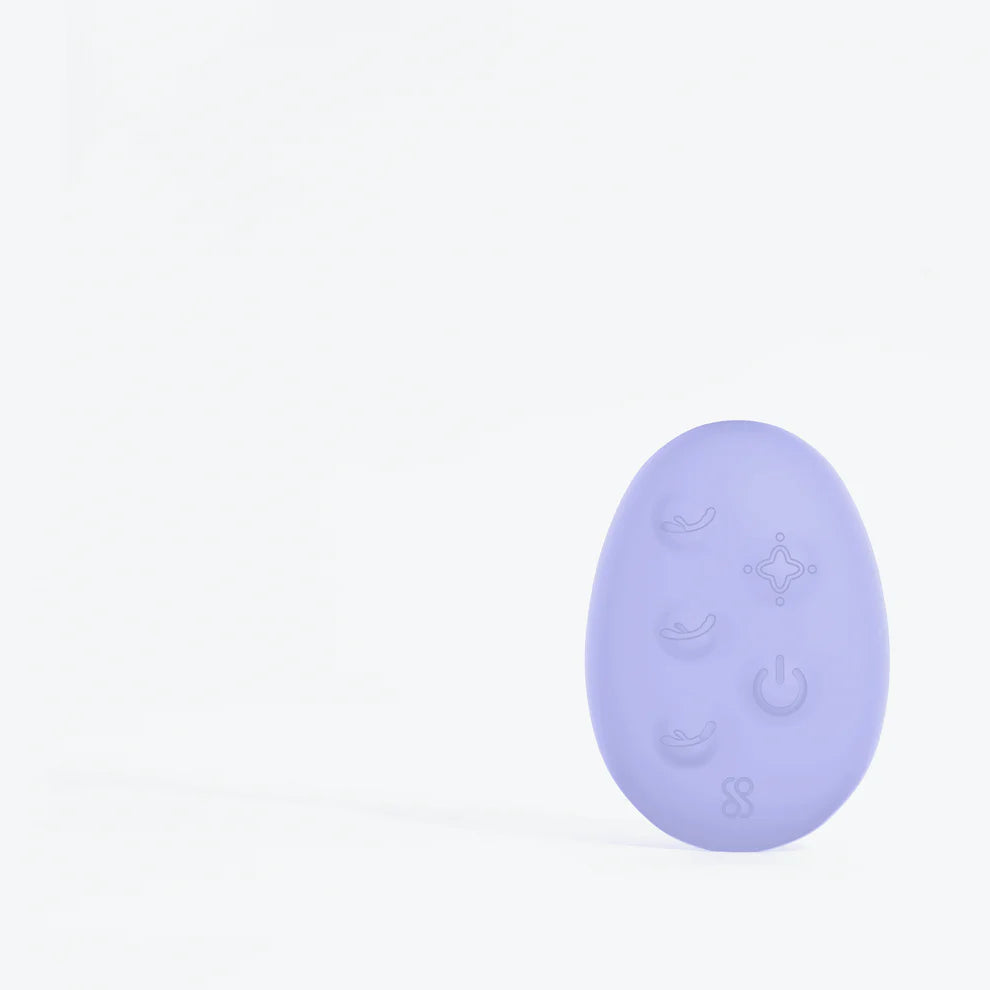Duopeak – AI-Powered Double-Ended Vibrator for Shared Lesbian Pleasure shown in a romantic ambiance, representing shared pleasure and connection.