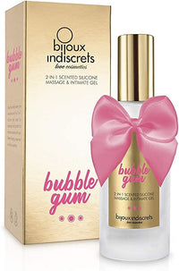 a bottle of bubble gum next to a box