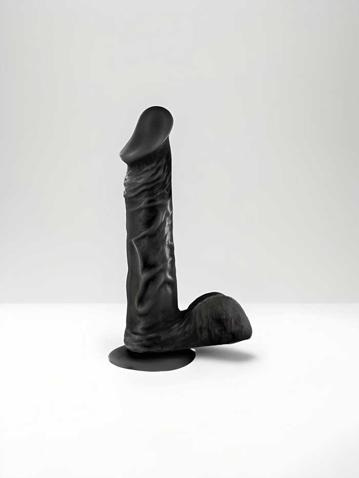 Various dildos and dongs displayed, ranging from realistic to textured designs. Explore our selection at Scandals, your premier destination for intimate pleasure products.