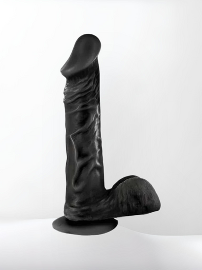 Various dildos and dongs displayed, ranging from realistic to textured designs. Explore our selection at Scandals, your premier destination for intimate pleasure products.