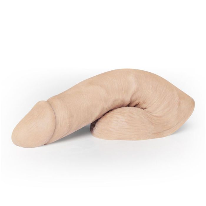 a wooden object that looks like a worm