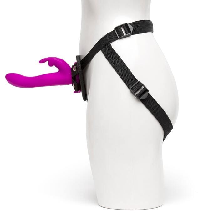 a white mannequin with a purple handle attached to it