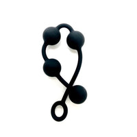 Elegant and hygienic BRUTUS PEARLS Silicone String of Pearls featuring four smooth anal balls, perfect for enhancing intimate experiences.