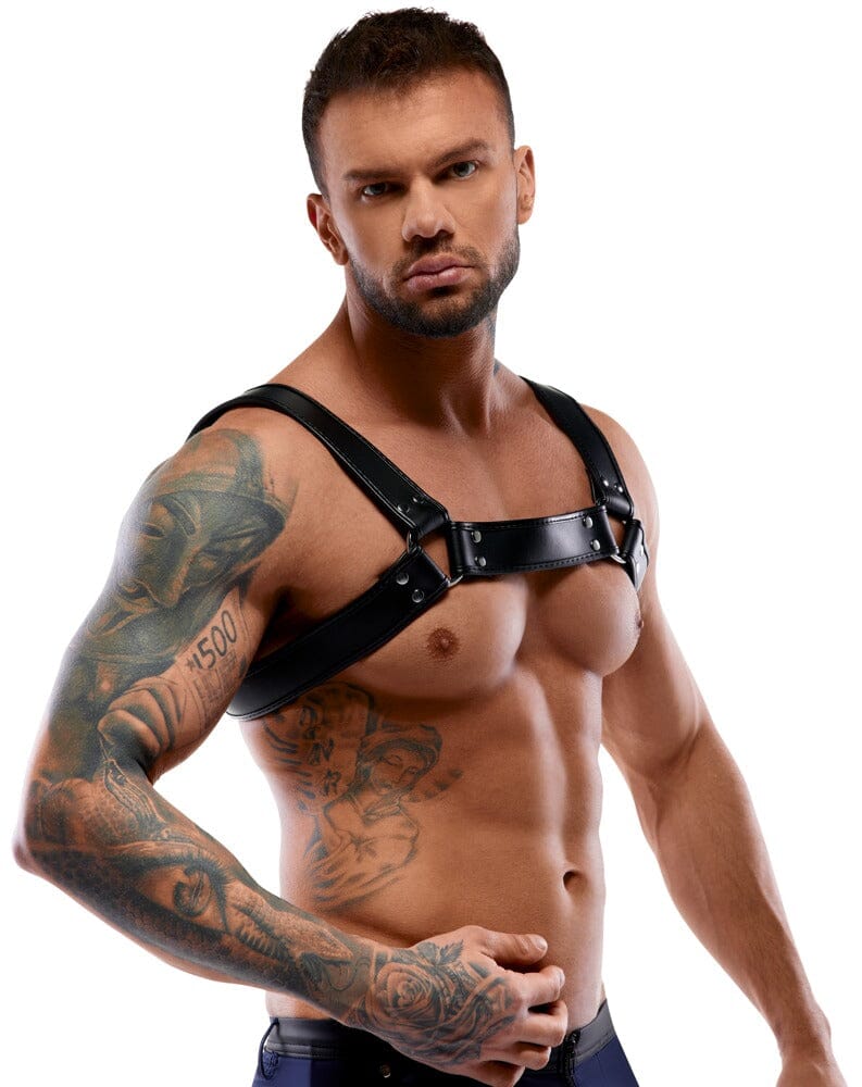 a man with a tattoo on his arm and chest