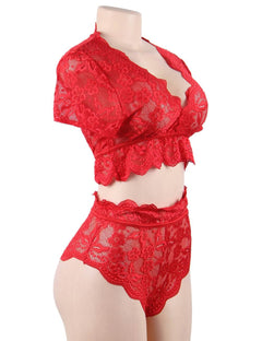 a woman wearing a red lingerie and panties