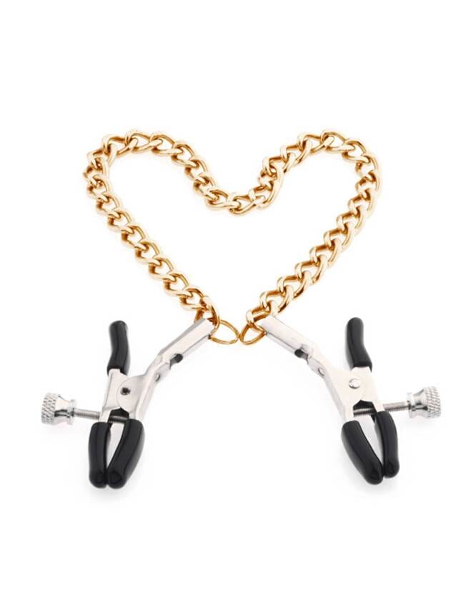 a pair of nipple clamps hanging from a chain