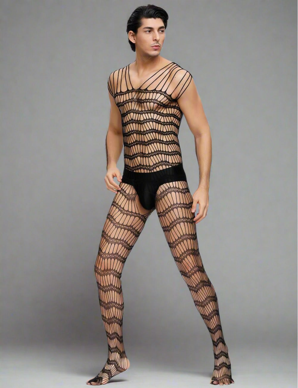 Men's net bodystocking with strappy shoulders and sheer fabric, designed for a bold, stylish look by Scandals Menswear.