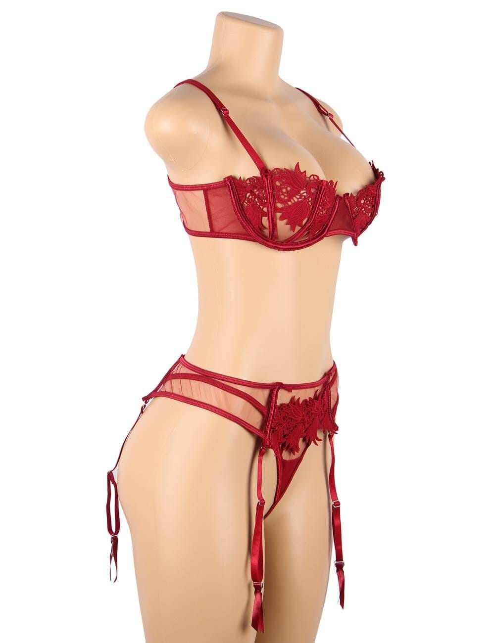 a female mannequin wearing a red lingerie