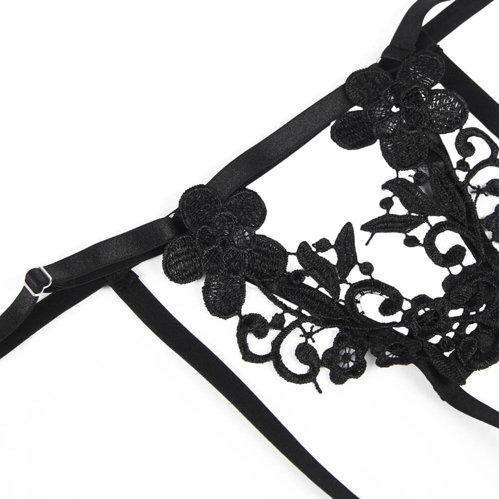 a close up of a black garter on a white background