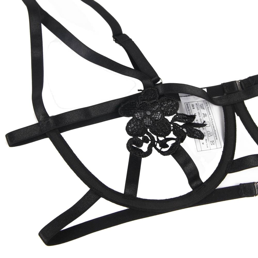 a black bridle with flowers on it