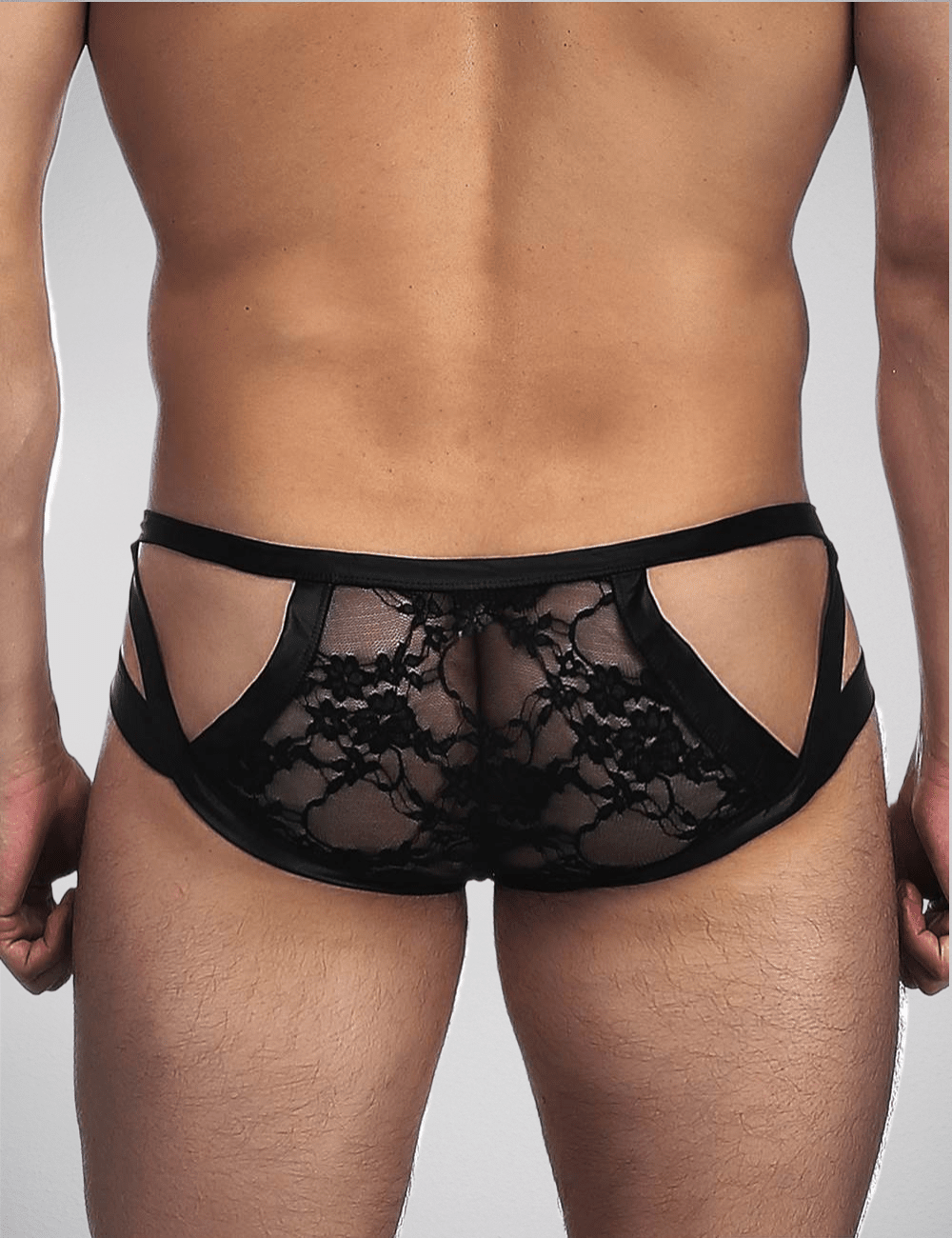 Scandals Men's lace and wetlook briefs featuring a sleek design, black fabric, and modern styling for a fashionable look.