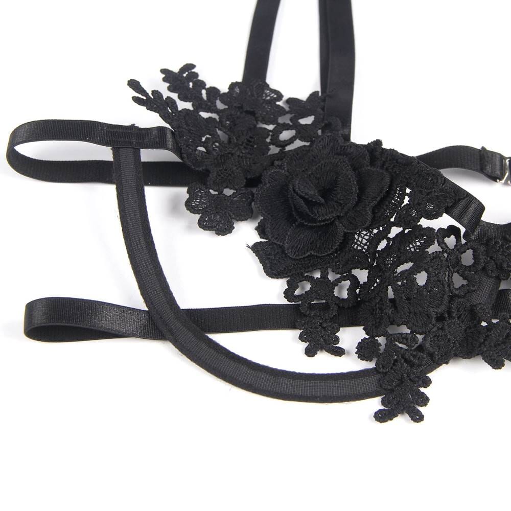 a black headband with flowers on it