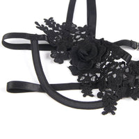 Thumbnail for a black headband with flowers on it