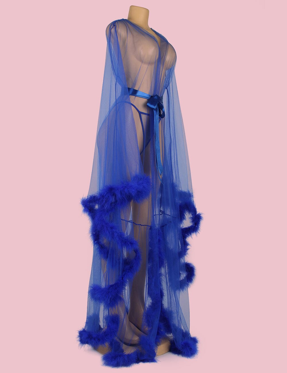 a mannequin wearing a blue dress with feathers on it