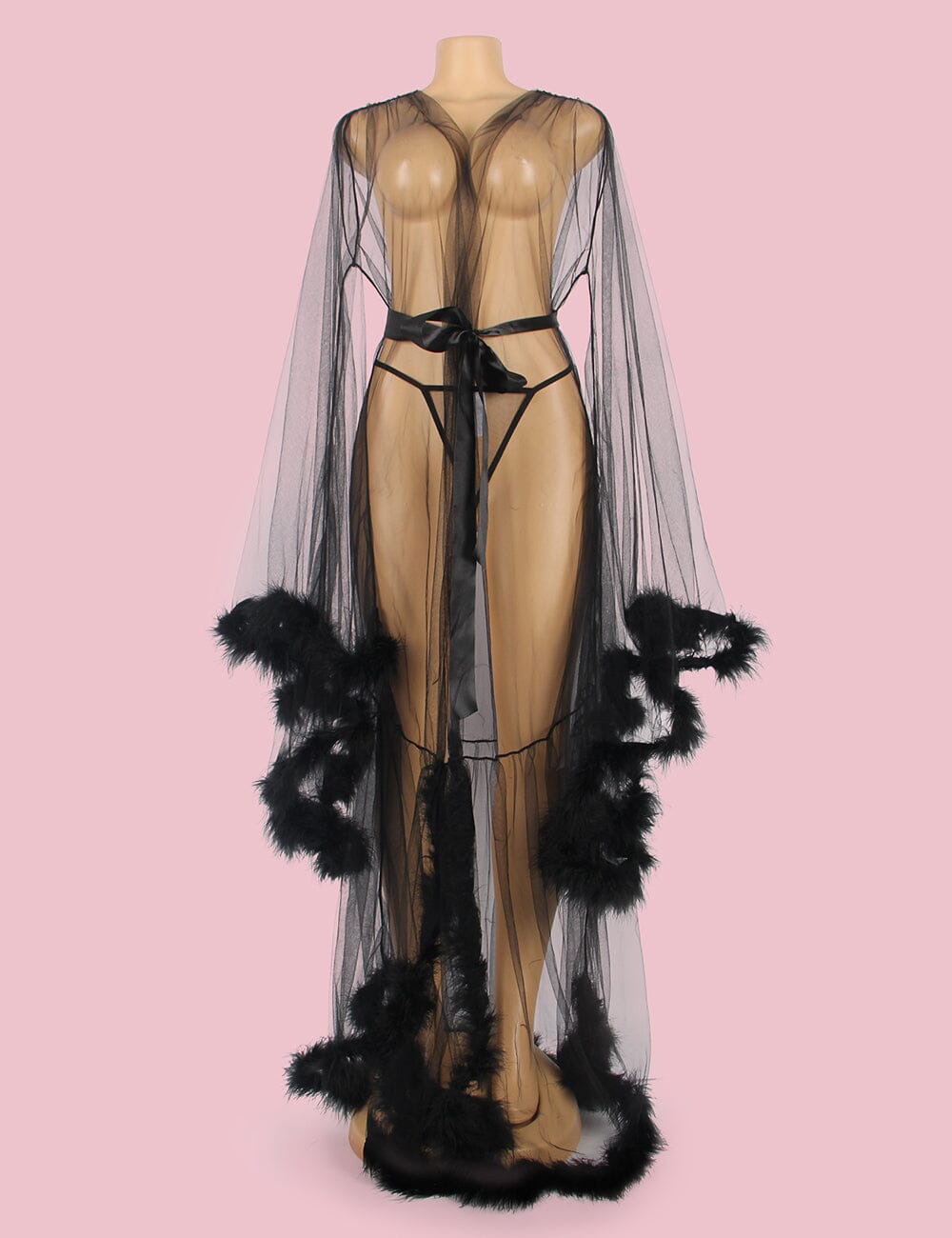 a mannequin dressed in a black lingerie with feathers