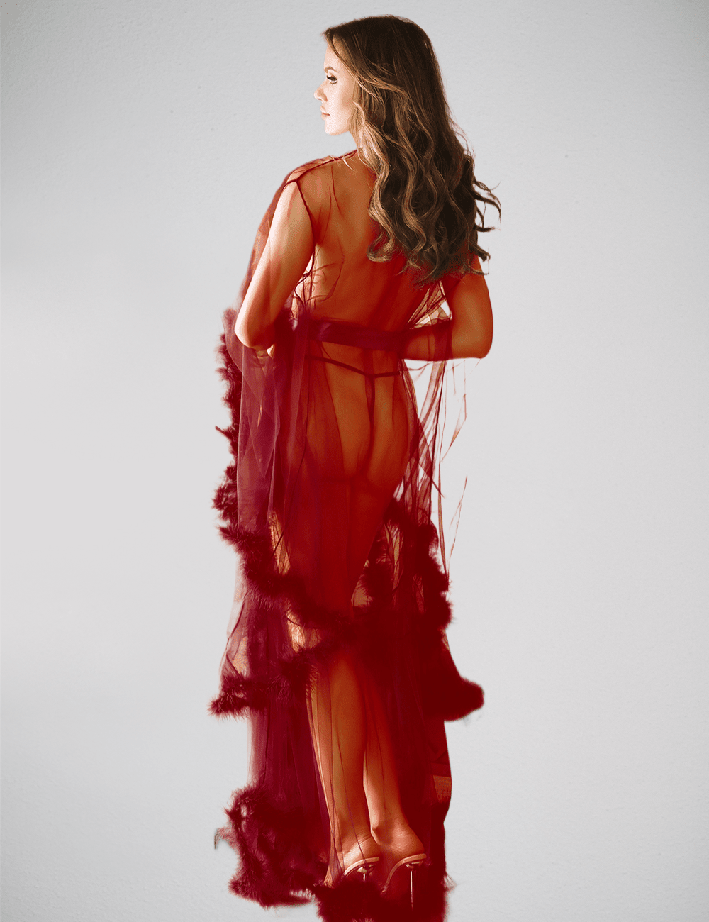 Soft plush faux fur edged mesh dressing robe with belt by Scandals Lingerie, shown hanging with a relaxed fit and luxurious texture.