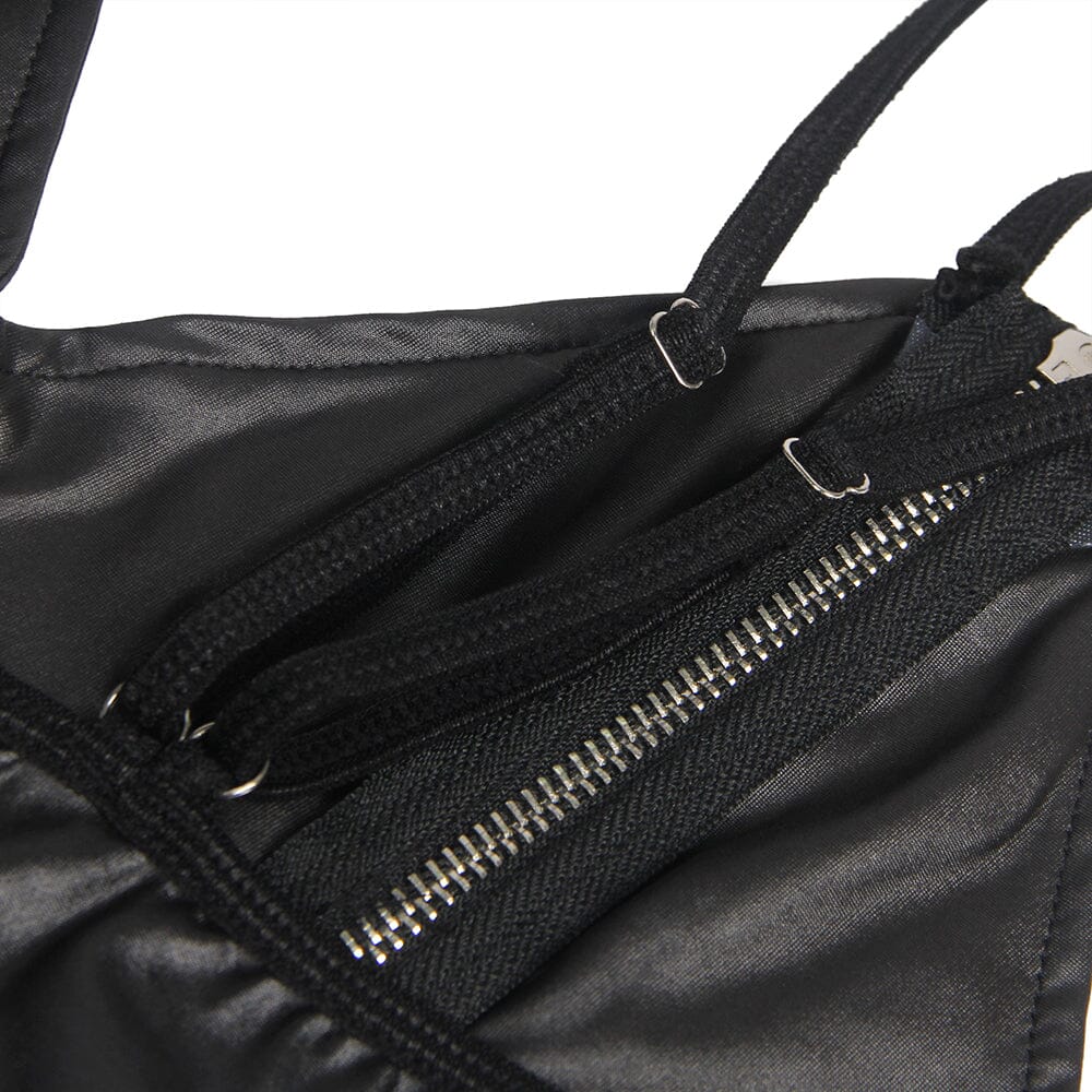 a close up of a black purse with zippers