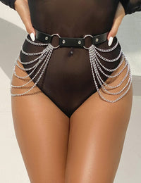 Thumbnail for a woman in a black bodysuit with chains around her waist
