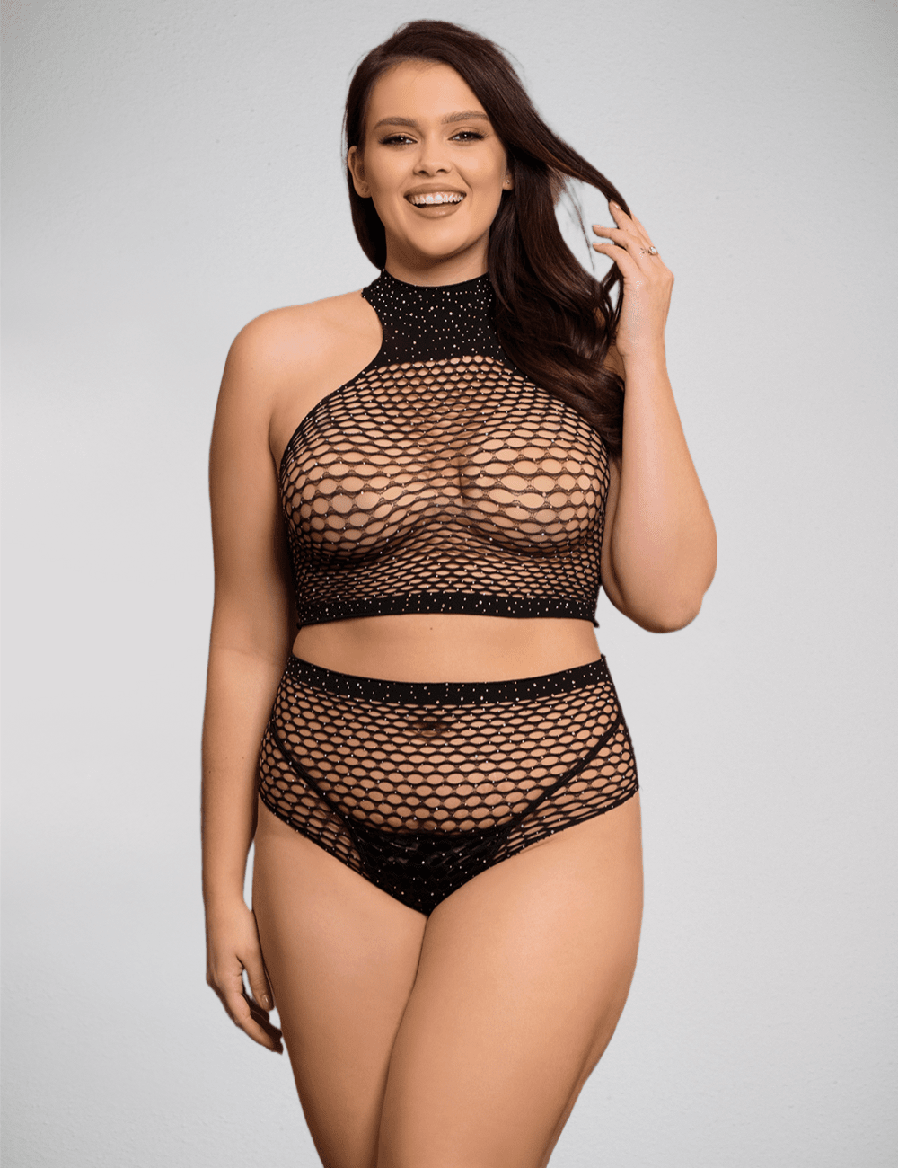 Scandals Lingerie fishnet rhinestone bodystocking with a two-piece top and shorts set, featuring intricate fishnet and sparkling rhinestones.