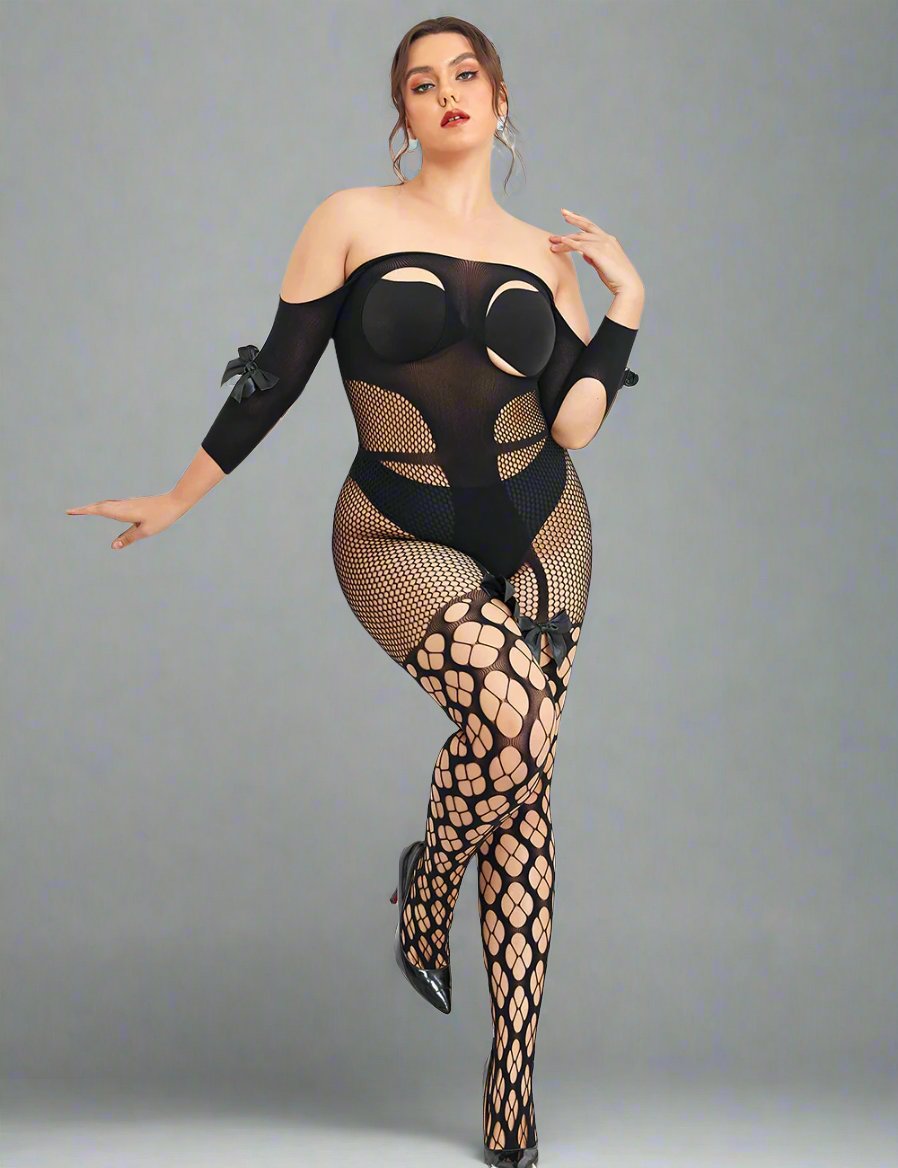 a woman in a fishnet bodysuit and fishnet stockings