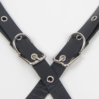 Thumbnail for a close up of a pair of black leather straps