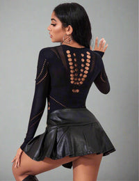 Thumbnail for a woman in a black top and a leather skirt