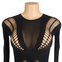 a black top with cutouts on it