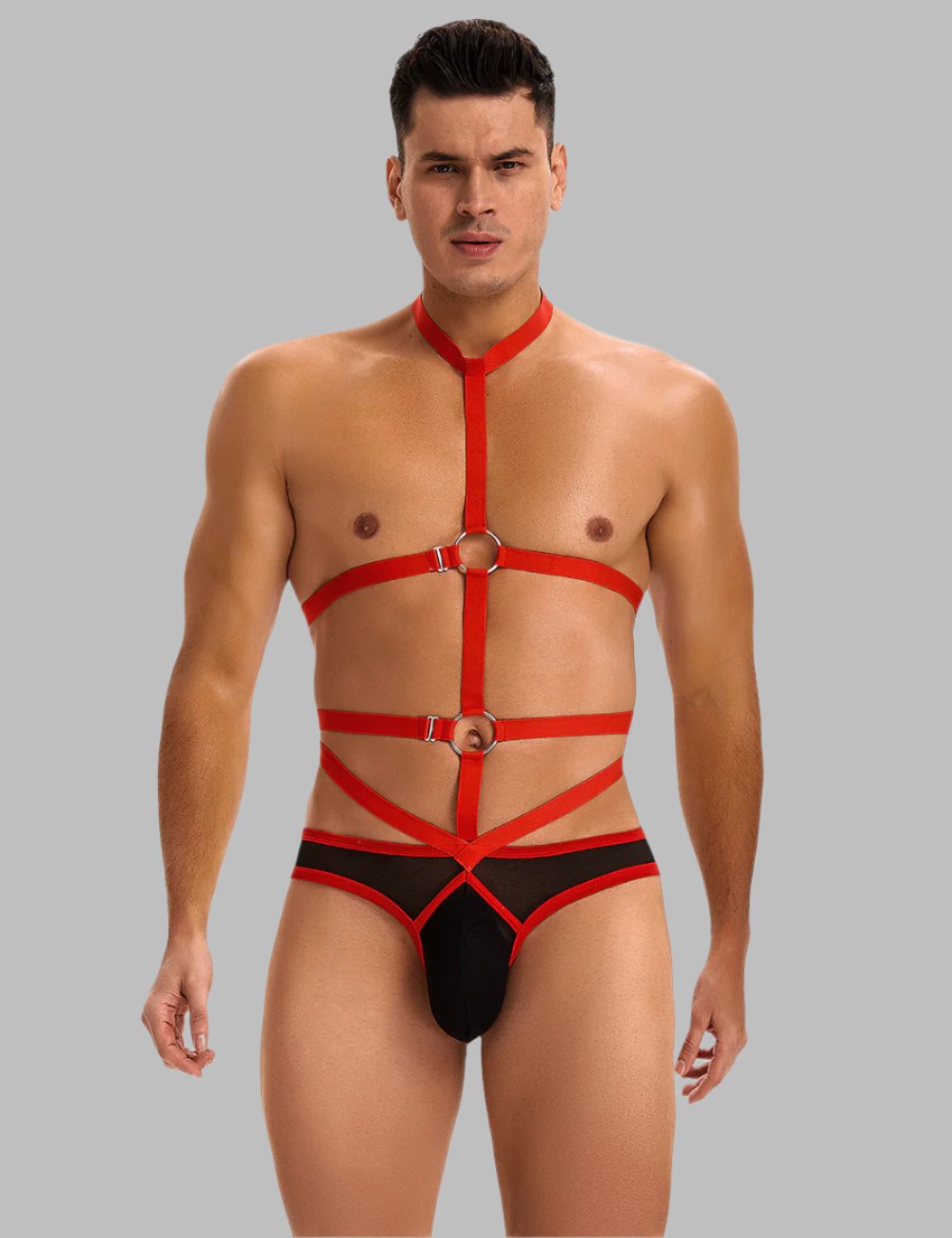 Men's bondage-inspired harness bodysuit by Scandals Menswear, featuring straps and leather details, designed for men's costume and outfits.