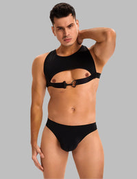 a man in a black scandals harness set