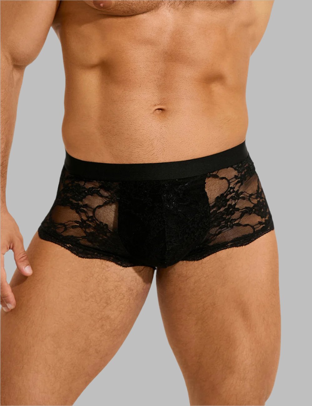 Men's see-through lace briefs by Scandals Menswear, showcasing a sexy and revealing design with intricate lace details.