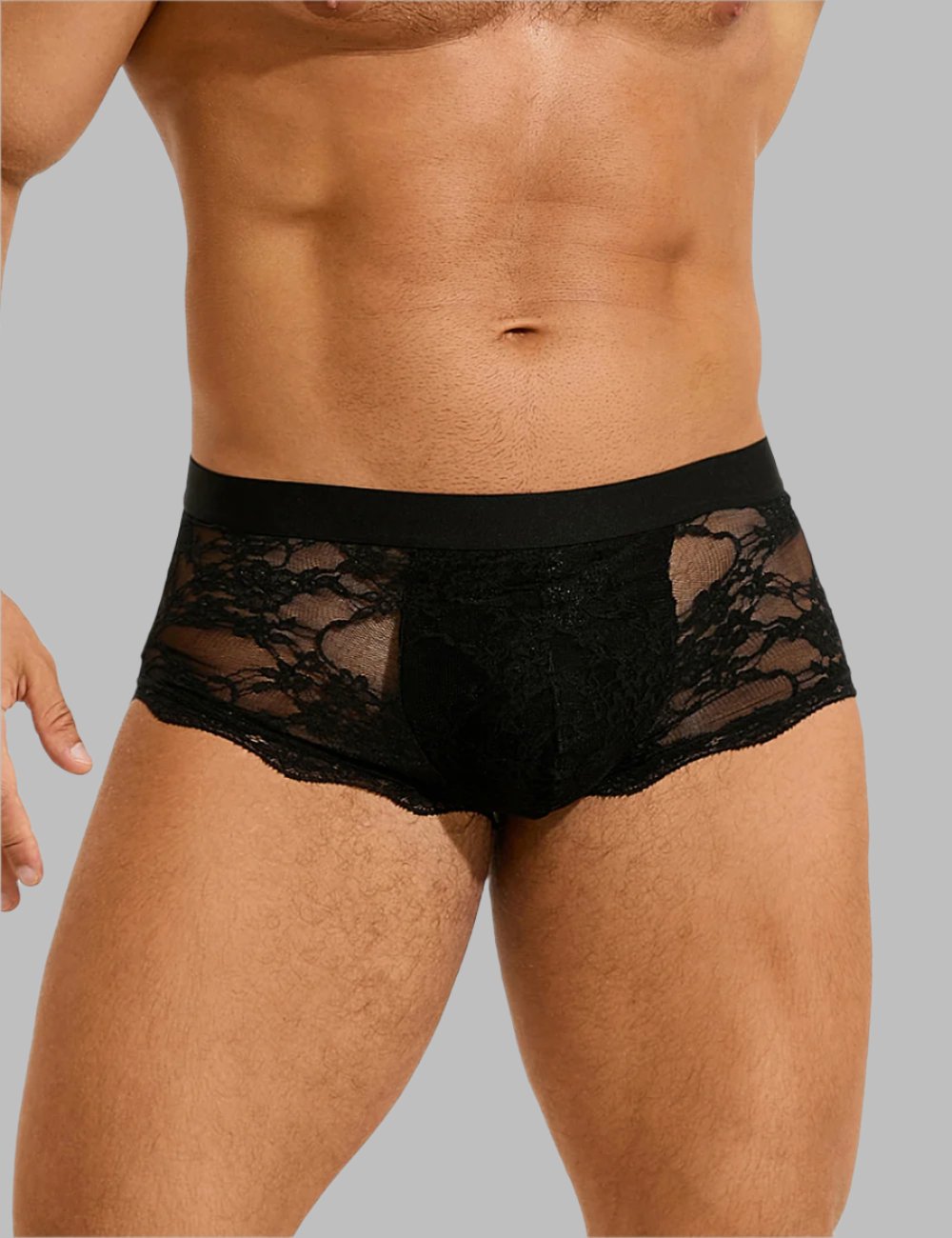 a man in a black underwear with a lace pattern