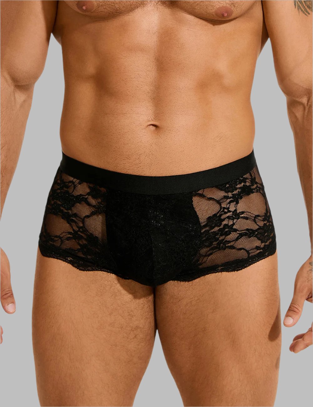 Men's see-through lace briefs by Scandals Menswear, featuring a revealing design and intricate lace fabric.