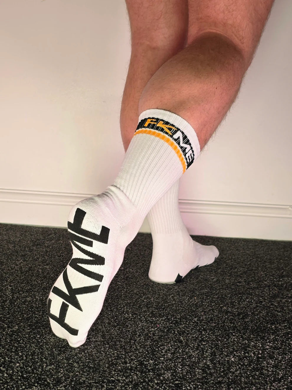 FKME large font logo socks for men, ultra-comfortable and stylish, fitting UK sizes 7-12, shown in the image.