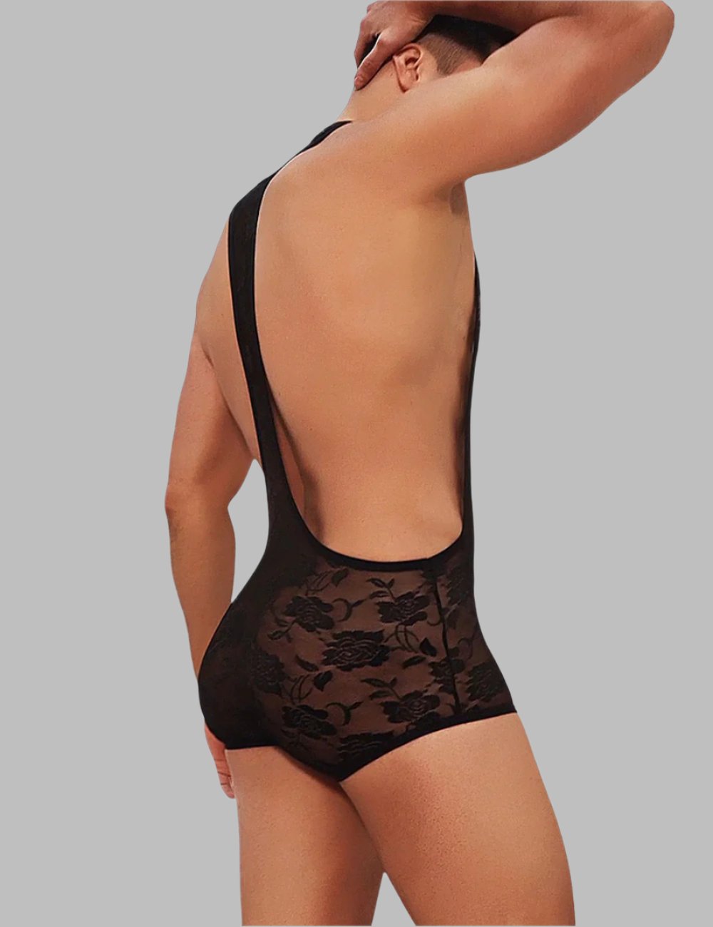 the back of a woman in a black lingerie