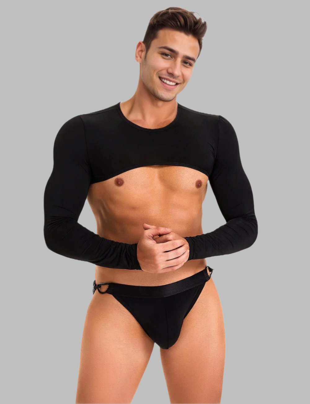 Men's long sleeve crop top and open back buckle brief set by Scandals Menswear, featuring stylish and revealing men's outfit.